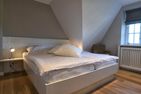  Reethuus Alt Wrixum Wrixum - Auch dieses Schlafzimmer verfügt über einen Kleiderschrank.