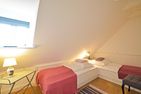  Reethus Dörpsend Haus 1 Midlum - In diesem Schlafzimmer finden Sie zwei Einzelbetten vor.