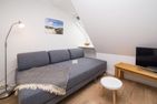  Wiese & Watt Norddorf - Sofa in der Wohnung Wiese & Watt