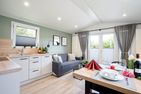 Ostseecamp Ferienhaus "Quartier 104" mit eingezäuntem Grundstück Scharbeutz - Wohnzimmer