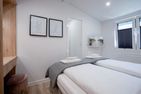 Ostseecamp Ferienhaus "Quartier 104" mit eingezäuntem Grundstück Scharbeutz - Schlafzimmer