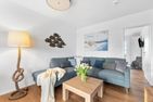  Ferienhaus Kaptains Strandhuus Olpenitz Ostseeresort Olpenitz - Wohnzimmer
