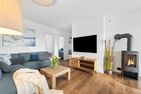  Ferienhaus Kaptains Strandhuus Olpenitz Ostseeresort Olpenitz - Wohnzimmer
