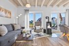  Ferienhaus Nordseeresort66 Hakuna Matata Büsum Büsum - Wohnzimmer