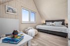  Ferienhaus Meer & Mehr I Ostseeresort Olpenitz - Schlafzimmer