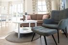  Ferienhaus Seeschwalbe 55 Fuhlendorf - Wohnzimmer