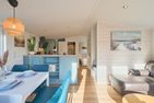 Ostseecamp Ferienhaus "Sunshine Beach" (130) mit eingezäuntem Grundstück Scharbeutz - Wohnzimmer