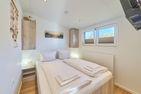 Ostseecamp Ferienhaus "Sunshine Beach" (130) mit eingezäuntem Grundstück Scharbeutz - Schlafzimmer