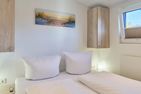 Ostseecamp Ferienhaus "Sunshine Beach" (130) mit eingezäuntem Grundstück Scharbeutz - Schlafzimmer