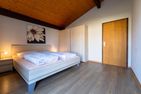 Ferienwohnpark Immenstaad am Bodensee Satteldachhaus (Typ 9) SD 63 Bodensee - Schlafzimmer