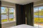  (34) Ferienhaus in Schweden am See Nömmen Smaland - Fantastischer Seeblick aus dem Schlafzimmer