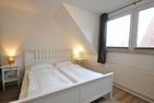  Ferienwohnung Am Harlebogen 10 Whg. 6 Carolinensiel - Schlafzimmer