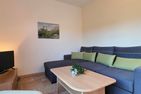  Ferienwohnung KWF6bEG Graal-Müritz Küstenwald - Wohnzimmer