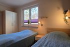  Ferienwohnung KWF3aOG Graal-Müritz Küstenwald - Schlafzimmer