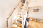  Wiese & Watt Norddorf - Treppe mit maritimen Detail in der Ferienwohnung Wiese & Watt