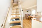  Wiese & Watt Norddorf - Treppe mit maritimen Detail in der Ferienwohnung Wiese & Watt
