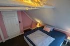  K94. Fischerhaus Greetsiel - Schlafzimmer