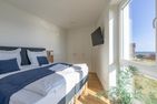  Ferienwohnung Seeloge im Bollwark Olpenitz Ostseeresort Olpenitz - Schlafzimmer