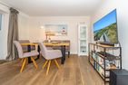  Ferienliebe Strandkoje Wenningstedt - Wohnzimmer