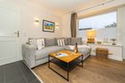  Ferienliebe Strandkoje Wenningstedt - Wohnzimmer