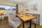  Ferienliebe Strandkoje Wenningstedt - Wohnzimmer