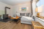  Ferienliebe Strandkoje Wenningstedt - Wohnzimmer