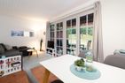  Ferienhaus Seeweg Wohnung 1 Scharbeutz - Wohnzimmer