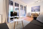  Ferienhaus Seeweg Wohnung 1 Scharbeutz - Wohnzimmer