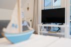  Ferienhaus Seeweg Wohnung 2 Scharbeutz - Wohnzimmer