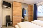  Nordland Appartements Wohnung Bornholm Wyk auf Föhr - In beiden Schlafzimmern befindet sich jeweils ein weiterer Fernseher.