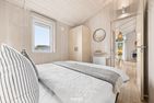  Ferienhaus Lykkehus Grömitz Ostholstein - Bett