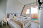 Strandperle Strandperle Appartement 402 Haffkrug - Schlafzimmer