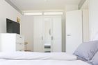  fewo1846 - StrandNest Glücksburg - großzügiges, modernes Schlafzimmer