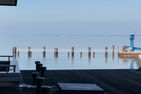 Haus Nordenlicht Ferienwohnung "Lütj Seeröver" Wittdün auf Amrum - Blick vom Balkon auf das Wattenmeer