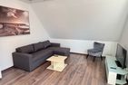  Ferienwohnung Sternenlicht Norderney - Wohnzimmer