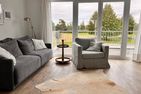  Ferienwohnung Oceanhouse Olpenitz Ostseeresort Olpenitz - Wohnzimmer