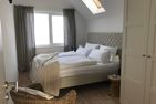  Ferienwohnung Oceanhouse Olpenitz Ostseeresort Olpenitz - Schlafzimmer