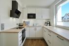 Ferienhaus LUV & LEE Ferienhaus LUV und LEE Scharbeutz - Küche / Küchenzeile