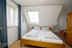  Gmelinstraße 17 d Wyk - Schlafzimmer mit Doppelbett