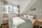  Ferienwohnung Dünengrün Trassenheide - Schlafzimmer