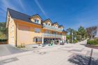  Ferienwohunung Dünenwald Trassenheide - Fassade / Eingang