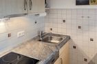  Ferienwohnung *Meeresleuchten* Wittdün auf Amrum - Küche / Küchenzeile