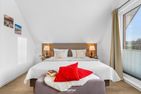  Ferienhaus Nordseeresort 35 WattWächter Büsum  - Bett