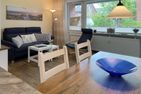  Ferienwohnung *Meeresleuchten* Wittdün auf Amrum - Wohnzimmer