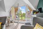  Ferienwohnung Strandloft Godewind Kronsgaard Geltinger Bucht - Wohnzimmer