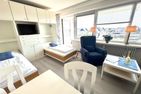  Dünenhof zum Kronprinzen, App. 102 Wenningstedt - Wohnzimmer