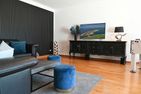 Ferienwohnung Deichsuite Büsum - Wohnzimmer