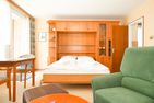  Ferienwohnung Glück Büsum - Wohnzimmer