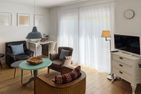  Ferienhaus *Koggenhüs* Norddorf auf Amrum - Wohnzimmer