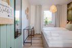 Green Village Ferienwohnung Igelnest Benz - Schlafzimmer